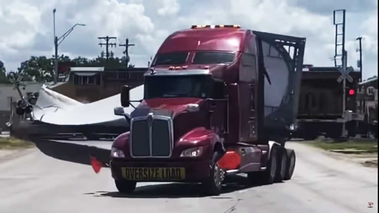 Viral Video Shows A Train Crash Into Semi Truck Carrying A Wind Turbine