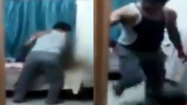 Disturbing Video Shows Father Brutally Thrashing Kicking His Yo Son For Lying