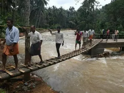 Villagers Construct Bridge