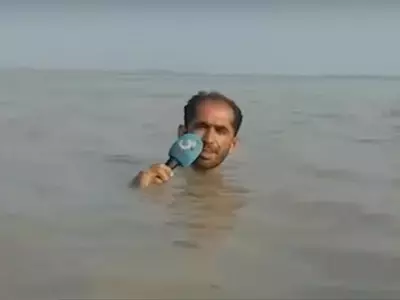 journalist in water