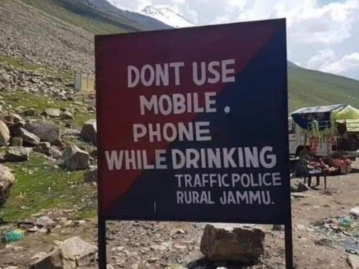 Image result for No mobile while driving caution board in Jammu and Kashmir
