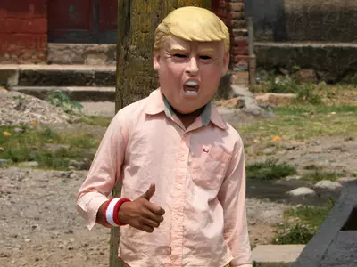 Man Wearing Donald Trump Mask Robs Shops