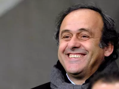 Platini happy to change calendar for 2022 WCup
