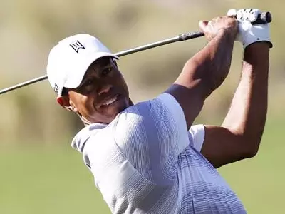 Tiger in upbeat mood after faring well Down Under
