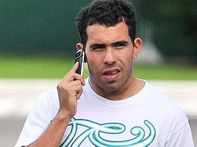 Carlos Tevez's agent in talks with AC Milan
