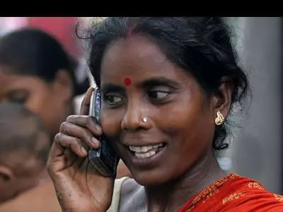 slum dwellers with mobile