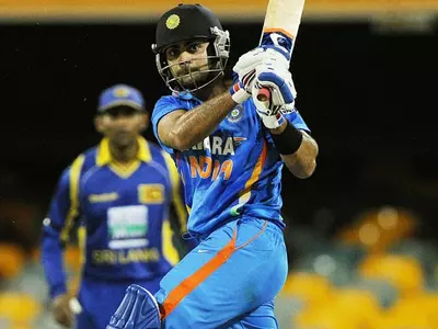 Virat Kohli helps India earn bonus point against Sri Lanka