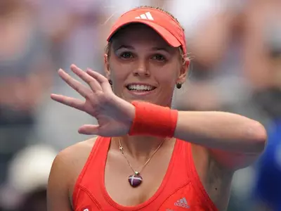 Wozniacki, Clijsters into 3rd round at Aussie Open