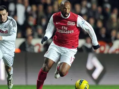 Henry apologises for swearing at Arsenal fan