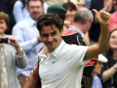 Federer stuns Djokovic, makes eighth Wimbledon final