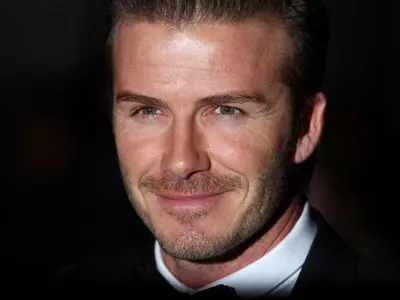 Becks takes bike and Rolls Royce for spin