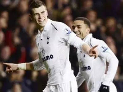 Bale Inspires Spurs to End Reds' Revival