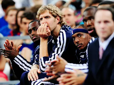 Nowitzki sits out in Mavericks' loss at Barcelona