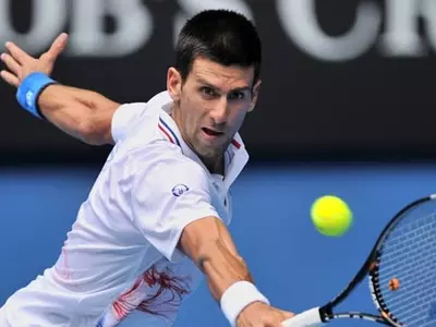 Djokovic into 3rd round at Shanghai Masters