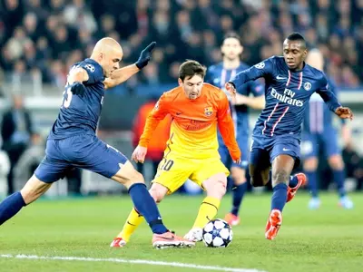 Paris St Germain's Alex and Matuidi challenge Barcelona's Messi during their Champions League quarter-final first leg soccer match