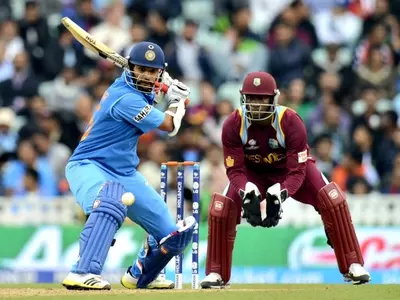 Dhawan, Jadeja Take India to Semifinals