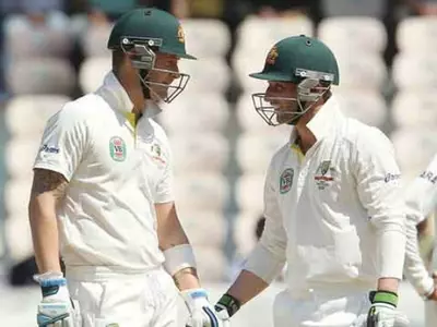 Phillip Hughes and Michael Clarke in action