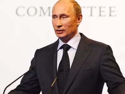 Russian President Vladimir Putin speaks at an International Olympic Commitee (IOC) executive board meeting