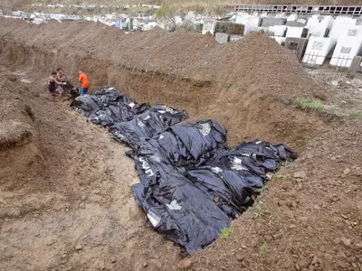 Typhoon-Struck Philippine City Begins Mass Burial