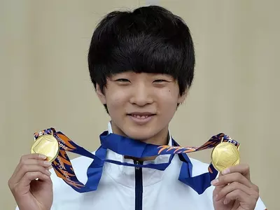 Shy teenager Kim Cheong-Yong beat the Olympic and world champion to individual gold as South Korea swept the men`s 10 metre air pistol titles at the Asian Games Sunday