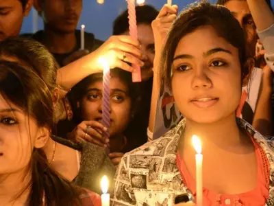 candle vigil against rape