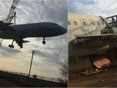 Crane Carrying An Air India Plane Crashes Into The Boundary Of Hyderabad Airport