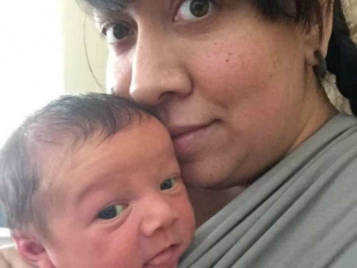 this hilarious image of a new born baby who came out holding his