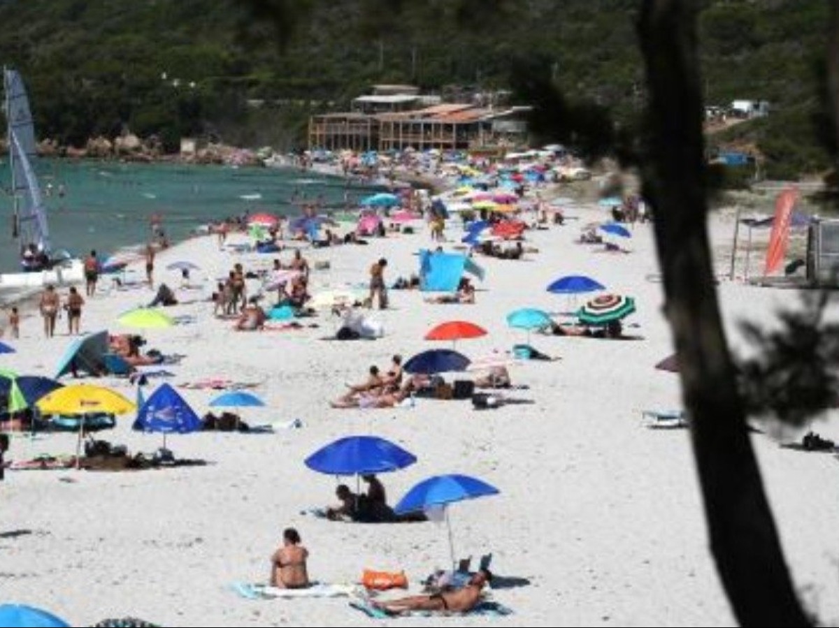 French Government Defends Right To Sunbathe Topless