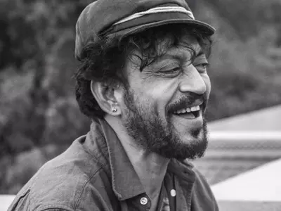 A black and white still of Irrfan Khan.