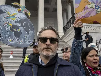 joaquin phoenix at a climate change protest