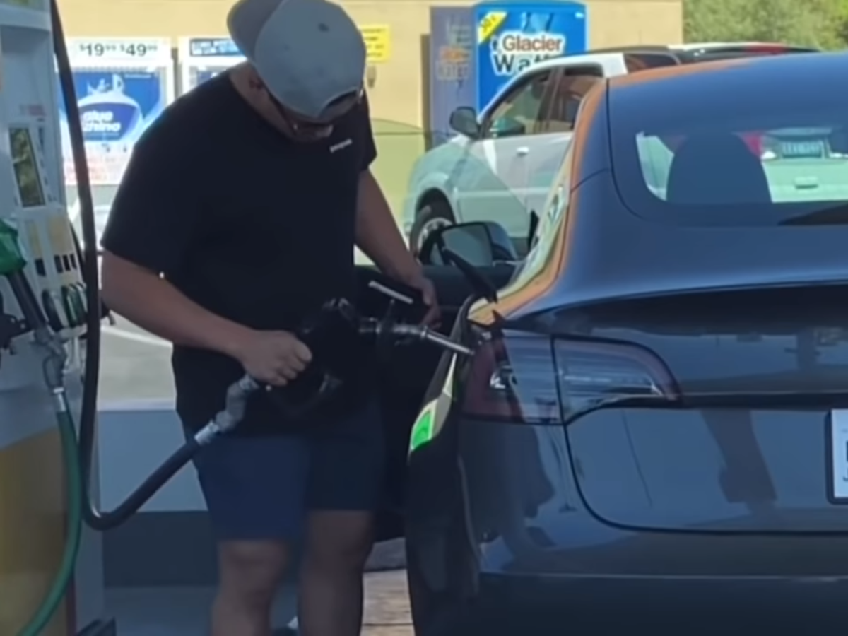 Watch A Man Try To Fill His Tesla Model 3 With Petrol