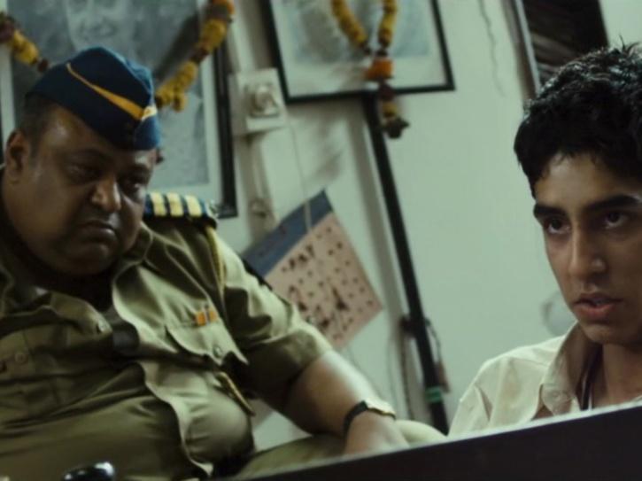 Saurabh Shukla as Constable Srinivas in Slumdog Millionnaire.