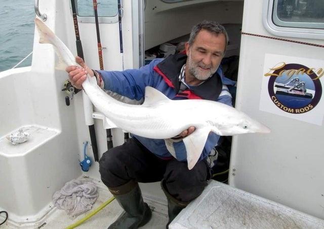 Jason Gillespie with the tope shark he caught near Isle of Wight