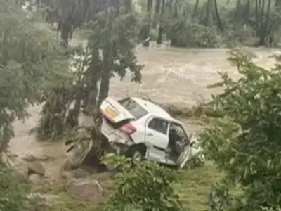 car-floods-last call hyderabad man washed away