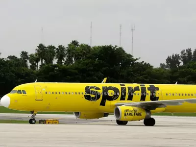 spirit-aircraft-parked-on-runway-5f914c16321e4