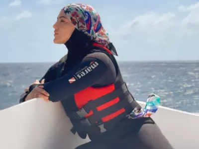 A photo of Sana Khan wearing Hijab as she goes for snorkelling.