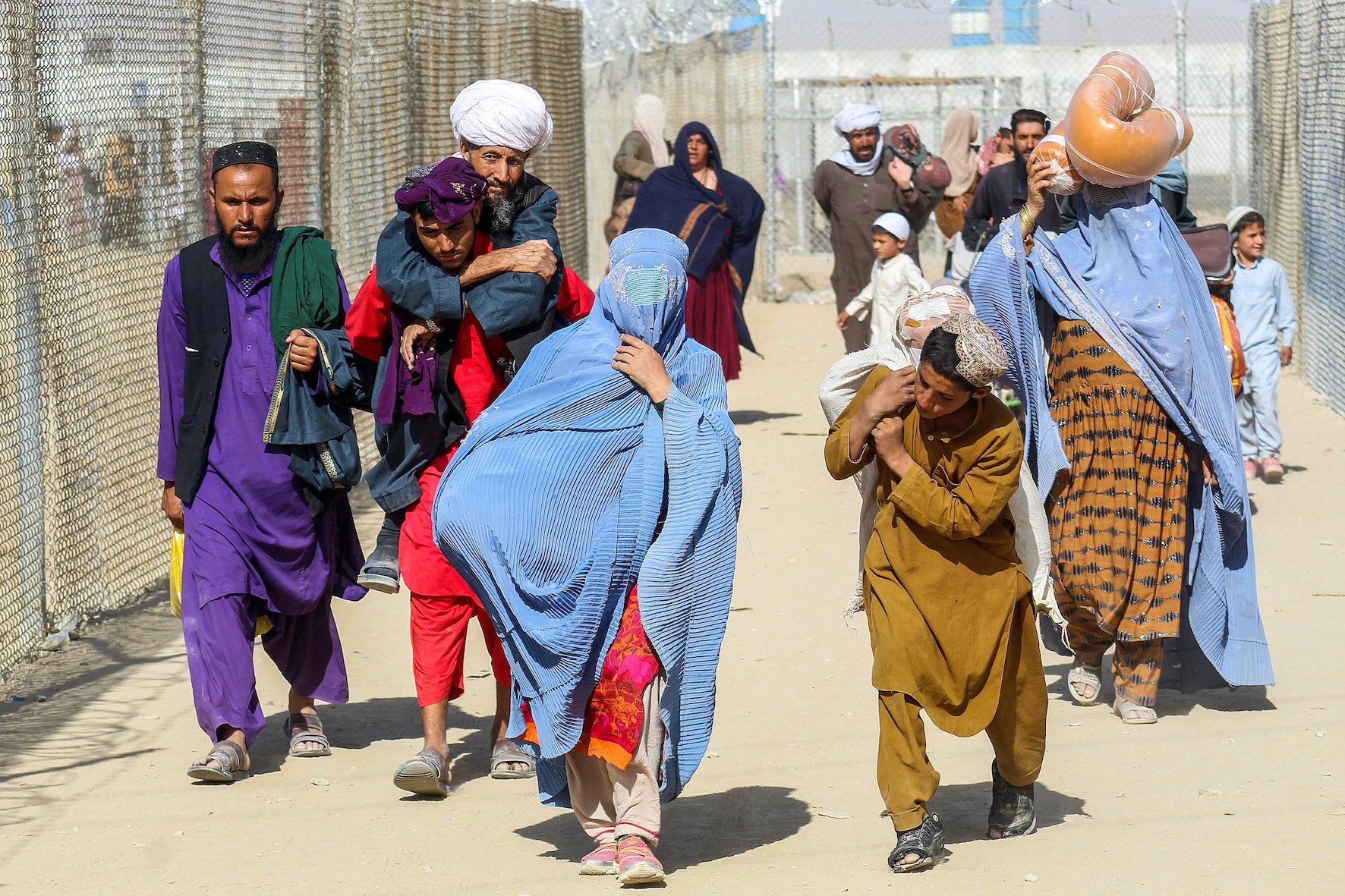 After Kabul, Now Haunting Visuals Show Thousands Of Afghans Waiting At ...