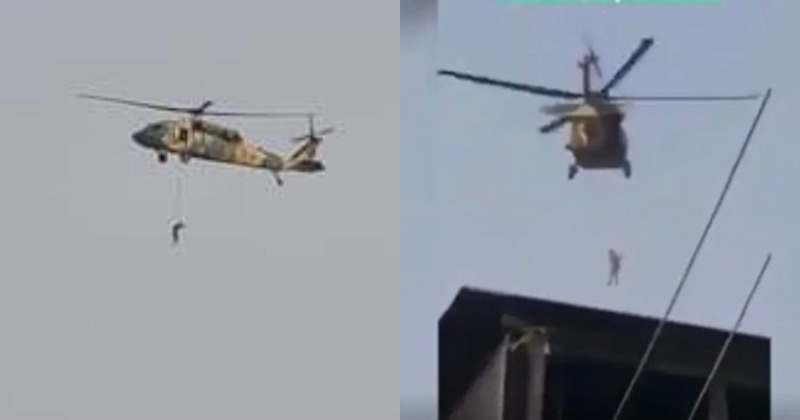 Taliban appear to fly US-made Black Hawk as person dangles