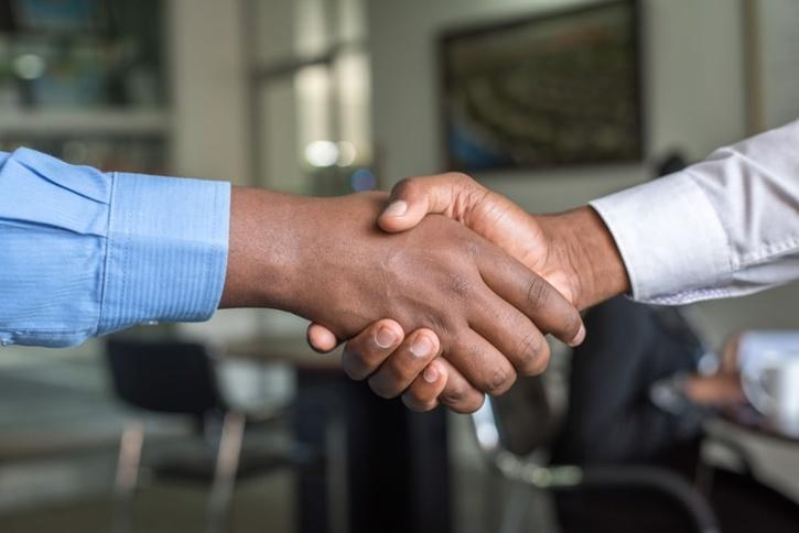 two people handshaking