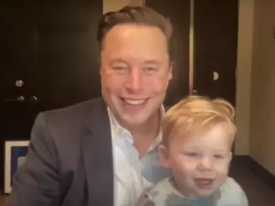 Elon Musk with his kid