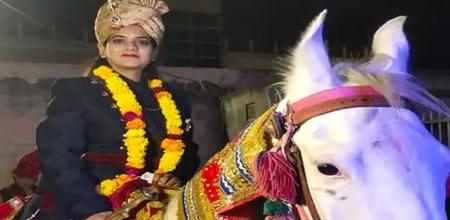 bride sits on horse wearing sherwani