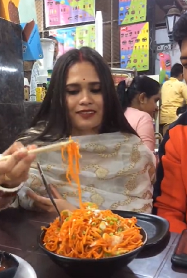 Husband Teaches Wife How To Use Chopsticks