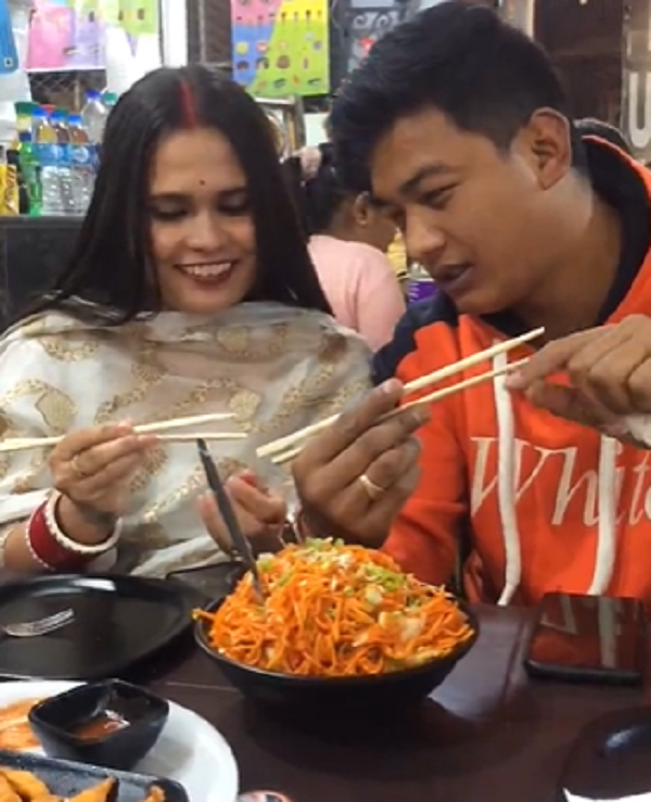 Husband Teaches Wife How To Use Chopsticks