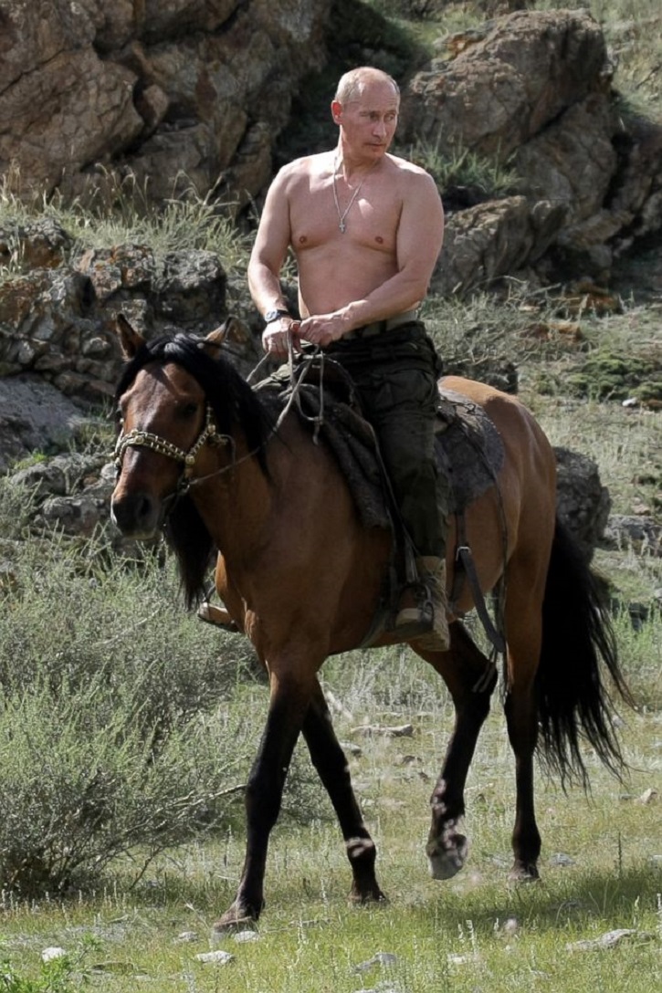 Putin Calendar Shows Him Shirtless With A Rifle