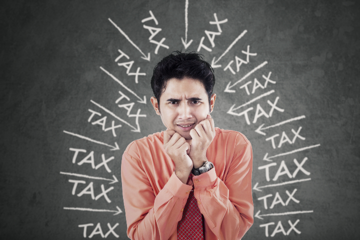man stressed with tax