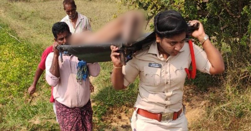 Andhra Police Si Carries Dead Body On Her Shoulders For Its Last Rites 