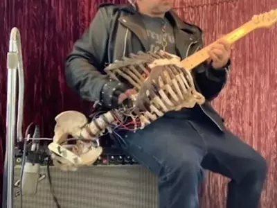  skeleton of dead uncle turned into guitar