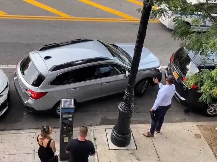 Driver Gets Car Out Of Tight Parking Spot, People Are Impressed