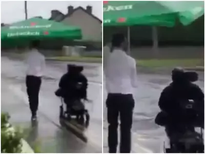 Man helps wheelchair bound