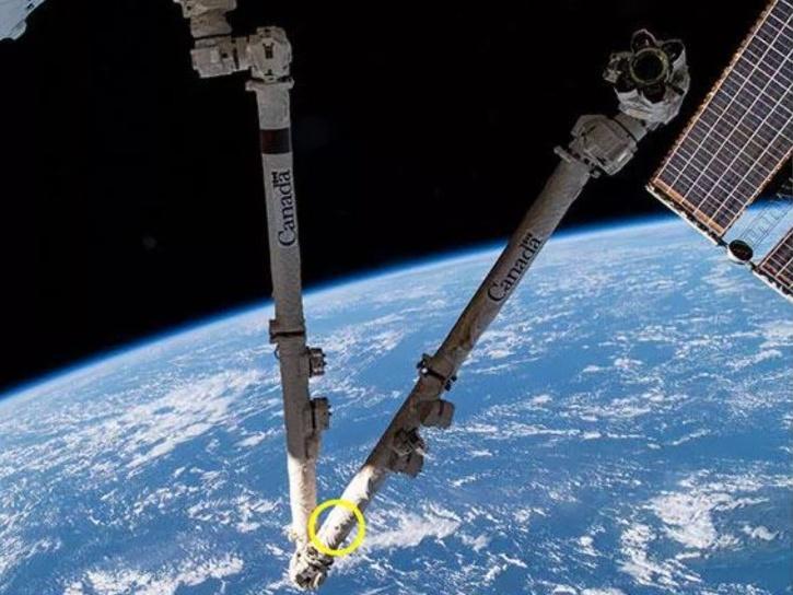 These images show the debris strike on the Canadarm2 on the ISS.